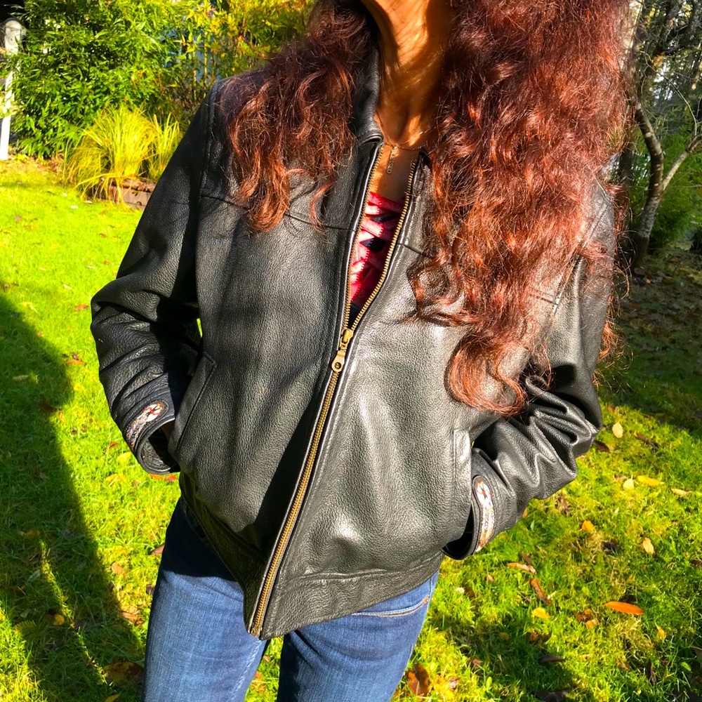 Black leather jacket with Harley-Davidson appliqué